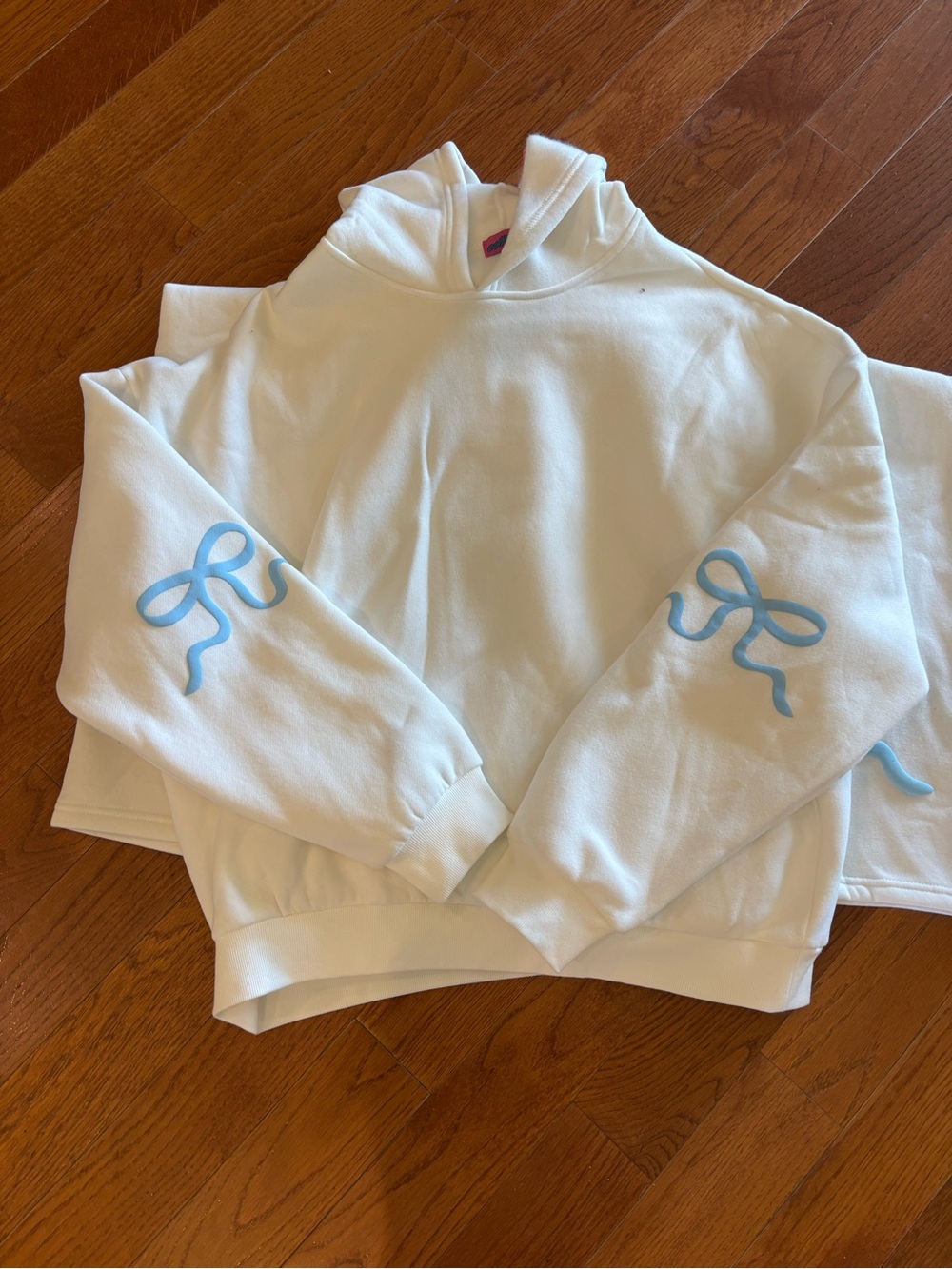 Edikted Cream Hoodie with Pink Tag Accent